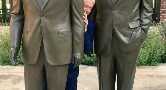 Bill Clinton hiding in the Bushes.