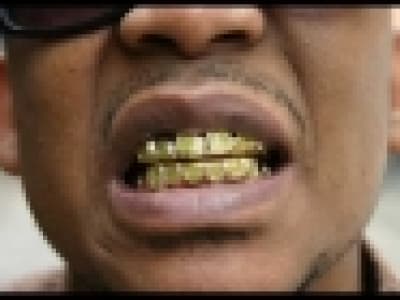 Taz Buckfaster - Gold tooth grin